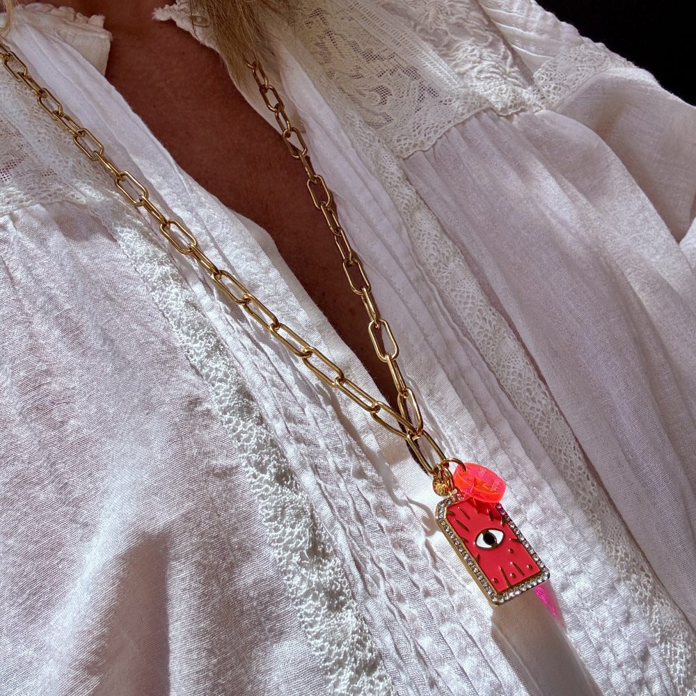 Collier Palmye chaine longue en acier inoxydable, pendentif rose pep's plaque oeil en acier inoxydable et strass.