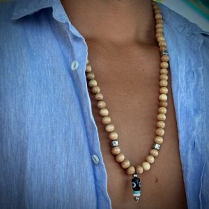 Collier ou sautoir Andréa, un collier mixte qui ira à merveille au cou de Mr ou de Mme, perles en bois, perles en acier, turquoise, un oeil pour le protection.